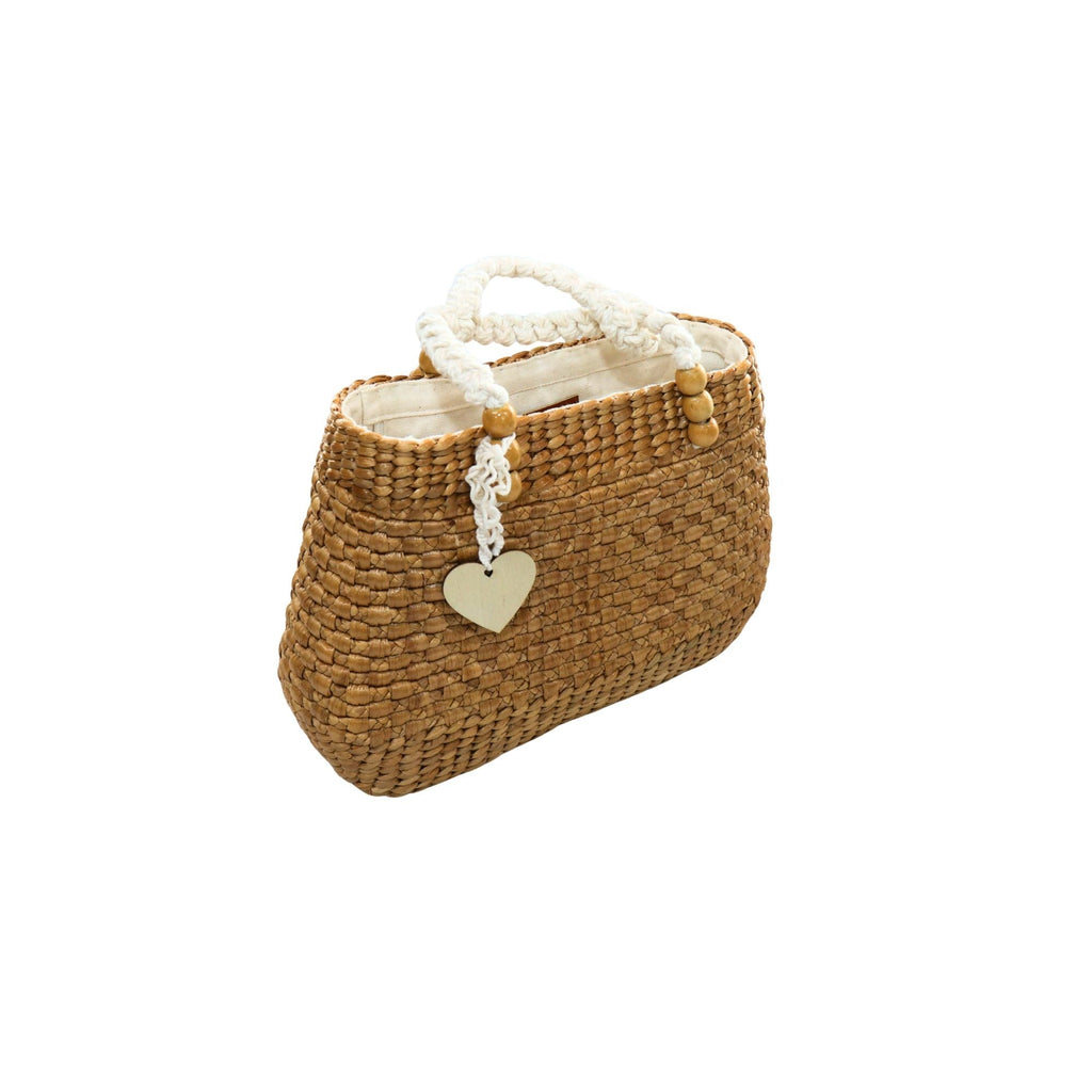 Natural braided water hyacinth bag worn as boho summer accessory – eQueen Handicraft