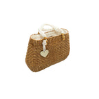Natural braided water hyacinth bag worn as boho summer accessory – eQueen Handicraft